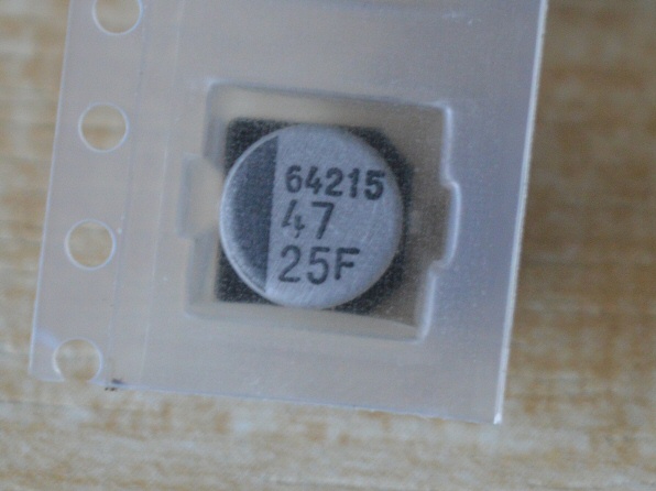 Capacitor top